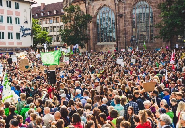 crowd of people standing outdoors