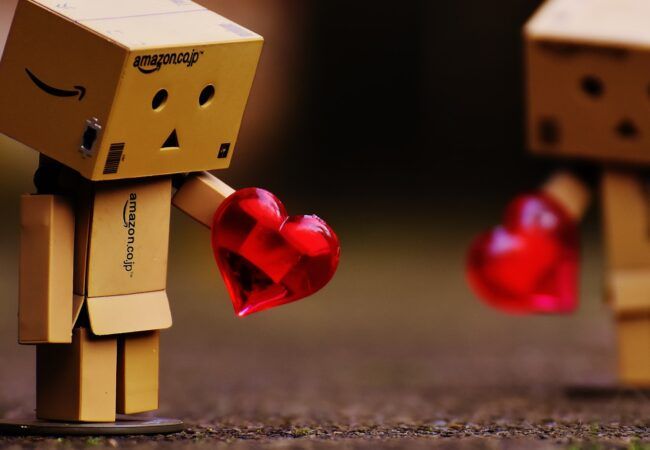 brown cardboard box with red heart ornament